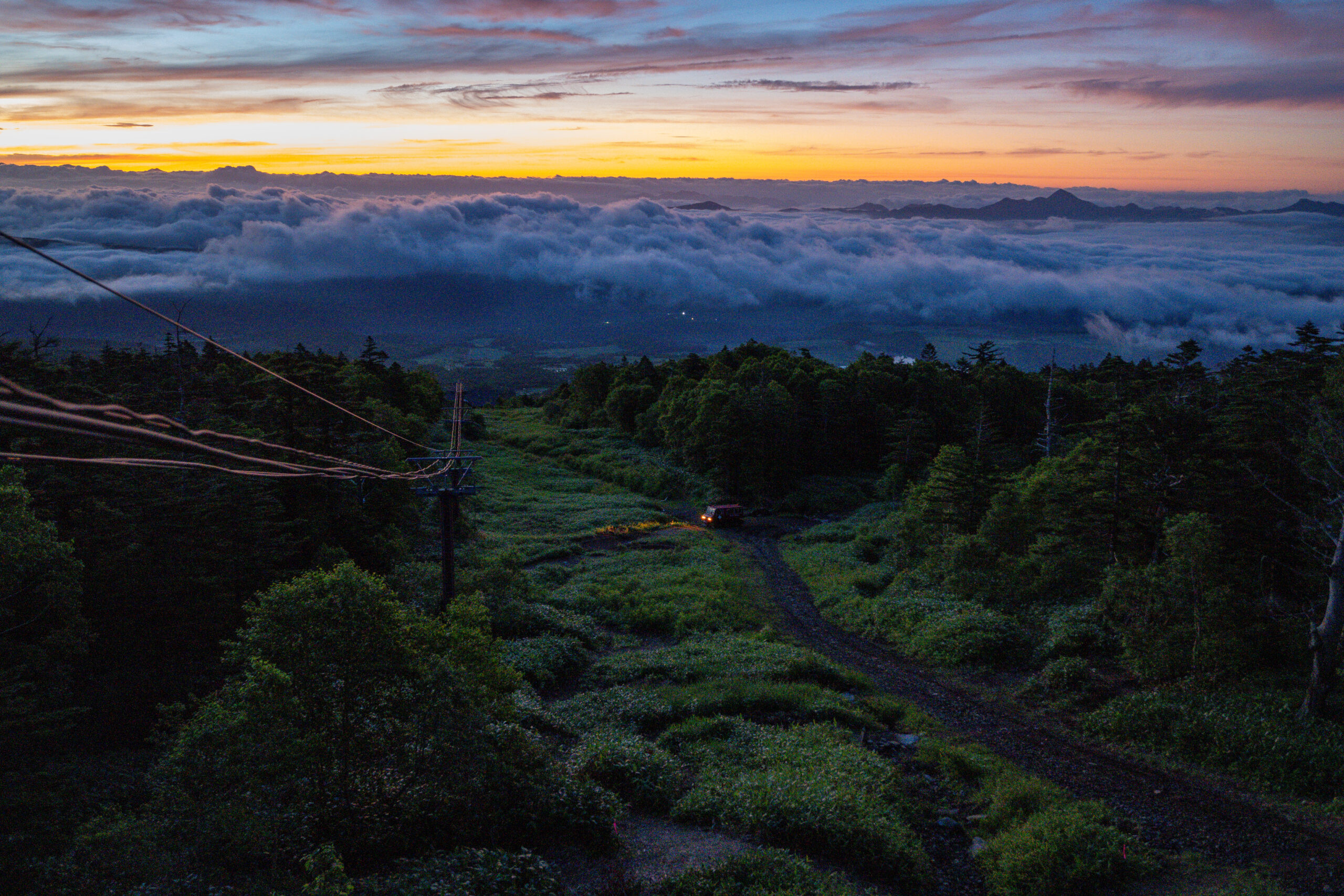 T1 Sunrise Downhill Course - 5,500m flow trail with rollercoaster berms and mountain views